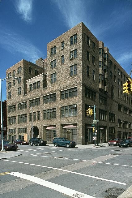 Photo:[Exterior view of a brick building, Michigan. Intersection]