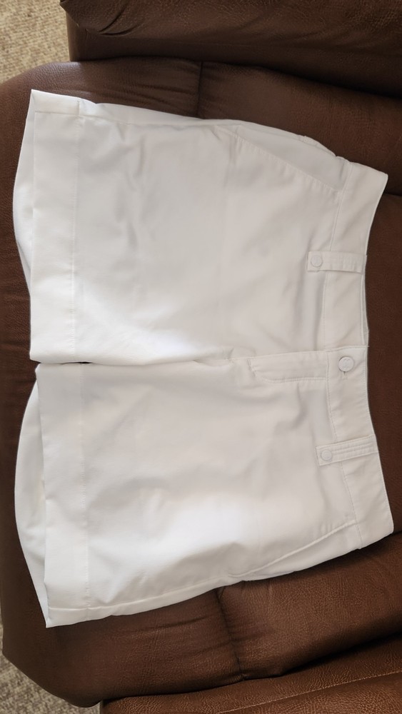 NWT Under Armour heatgear women's fitted 5 inch golf shorts, white, size 4