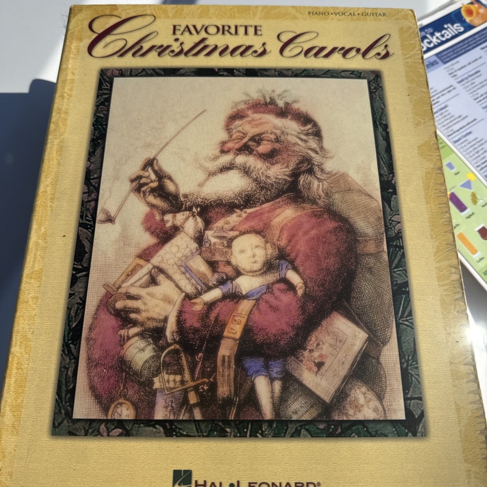 Favorite Christmas Carols Song Book for PIANO VOCAL GUITAR, Hal Leonard Corp.