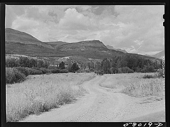 Photo:Road leading into mountains. Glacier National Park, Montana]