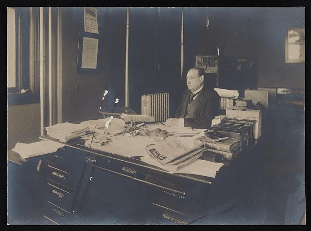 Photo:[Harvey Wiley, seated at his desk in the Bureau of Chemistry]