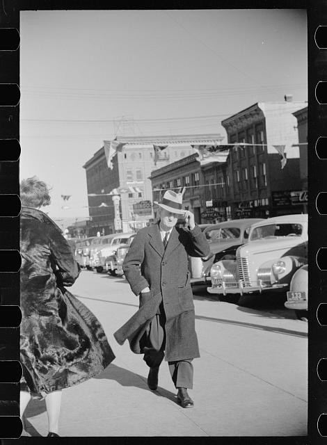 Photo:Downtown Street Scene Man Hat Cars 1935-1942