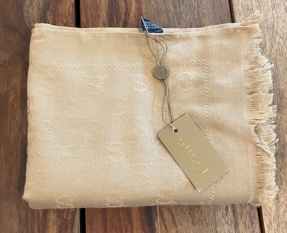 Gucci scarf new with tags minor imperfections barely visible