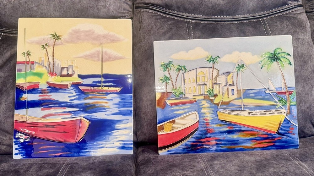 Vintage decorative tiles with raised painted glaze and vibrant tropical boats