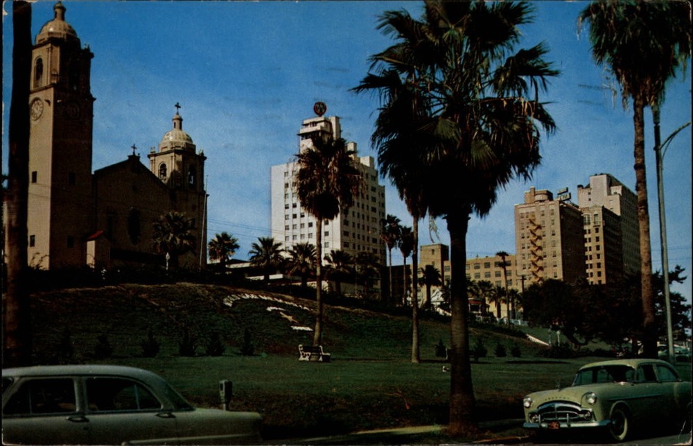 Corpus Christi Cathedral skyline Texas ~ 1950s cars ~ mailed 1957 Falfurrias TX