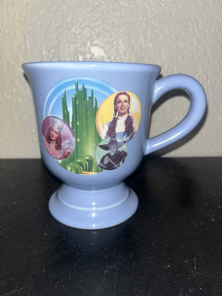 Wizard of Oz Blue Pedestal Coffee Mug Dorothy Toto Tin Man Lion Scarecrow