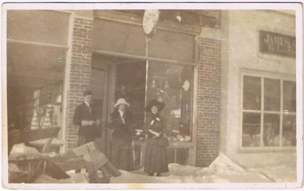 Postcard RPPC Christmas Photo Two Ladies & Gentleman Outside Shop