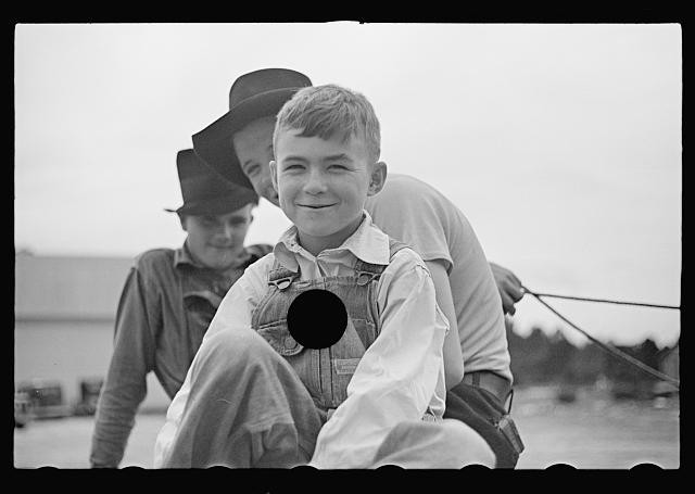 Photo:1930s Boy on Horseback with Man and Woman Portrait