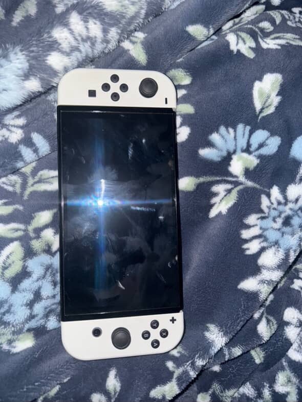 Nintendo Switch White OLED,Woks Perfectly Comes With All Cables Good Price