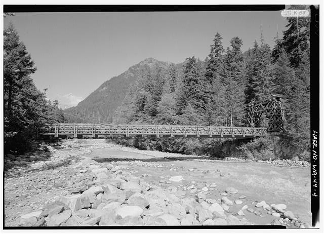 4. VIEW FROM DOWNSTREAM FACING EAST - Nisqually Suspension Bridge, Spanning