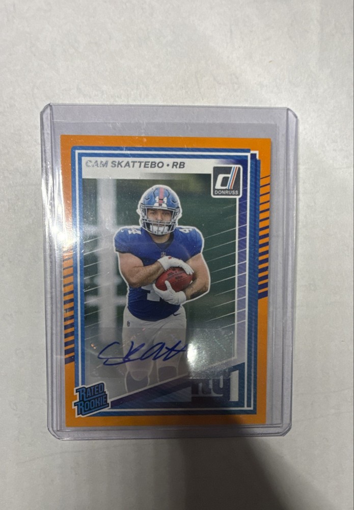 2025 Panini Donruss - Rated Rookie Cam Skattebo #302 Orange Autographs (AU, RC)