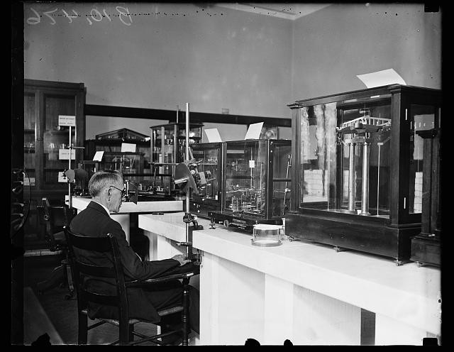 Photo:1936 Scientific Instruments Laboratory Man Examining Equipment