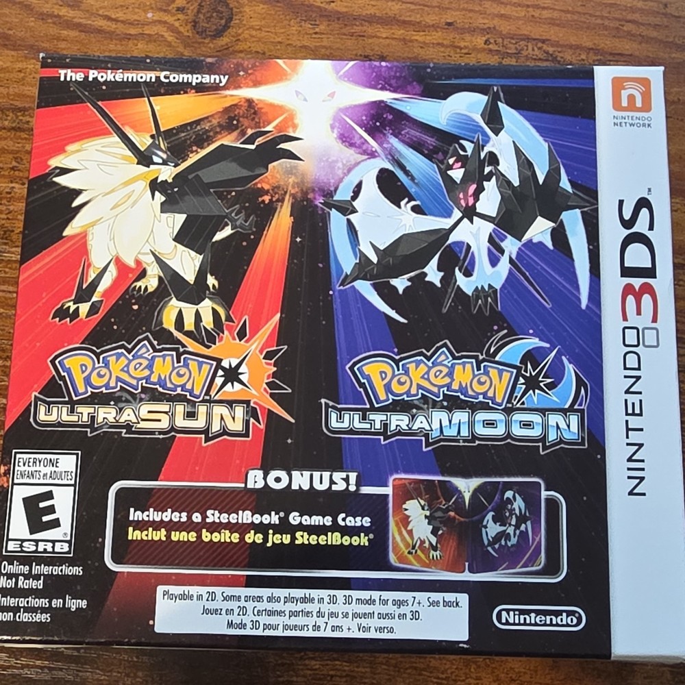 Pokémon Ultra Sun & Ultra Moon Nintendo 3DS SteelBook Case.Games factory sealed.