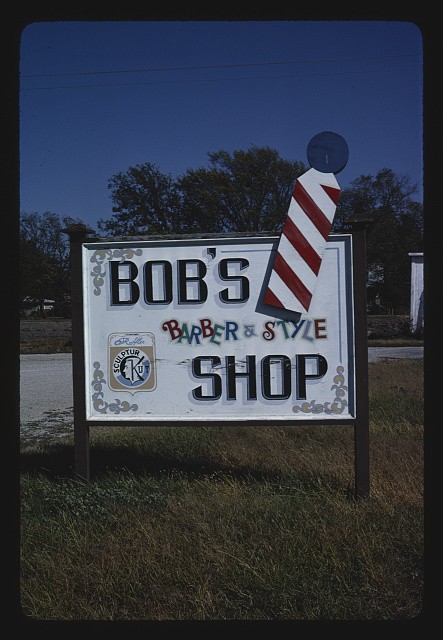 Photo:Erie Kansas 1979 Bob's Barber & Style Shop sign with barber pole
