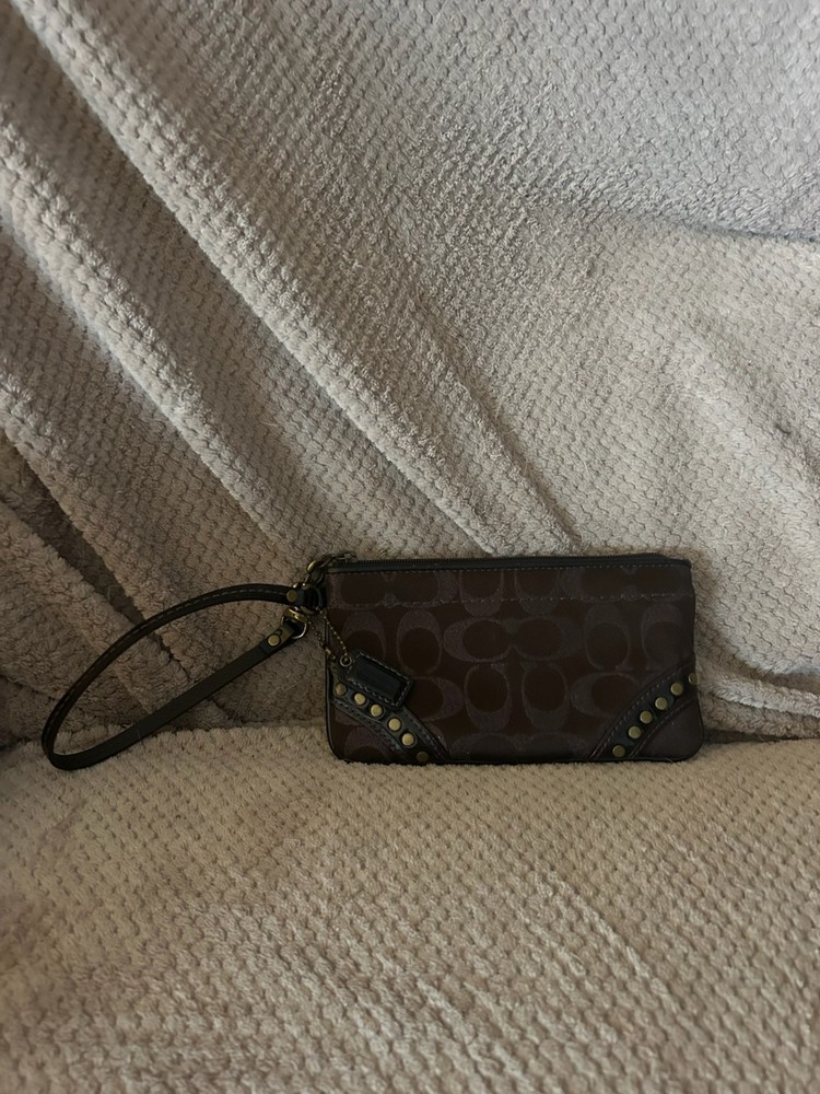 Coach dark purple hand wallet hardly used in excellent condition