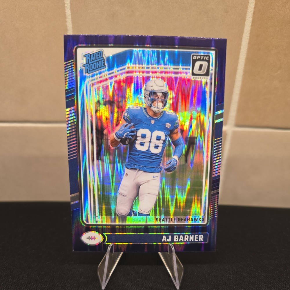 2024 Panini Donruss Optic - Rated Rookie AJ Barner #204 Purple Shock Prizm (RC)