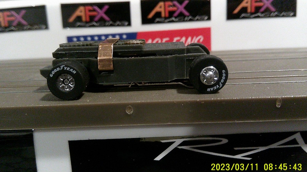 AUTOWORLD HO SCALE SLOT CAR T-JET ULTRA G+ CHASSIS PAINTED CHROME RIMS GOODYEAR