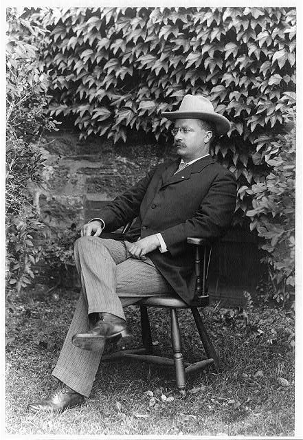 Theodore R Roosevelt,Governor,Honorable,hat,seated,outside,President,c1900