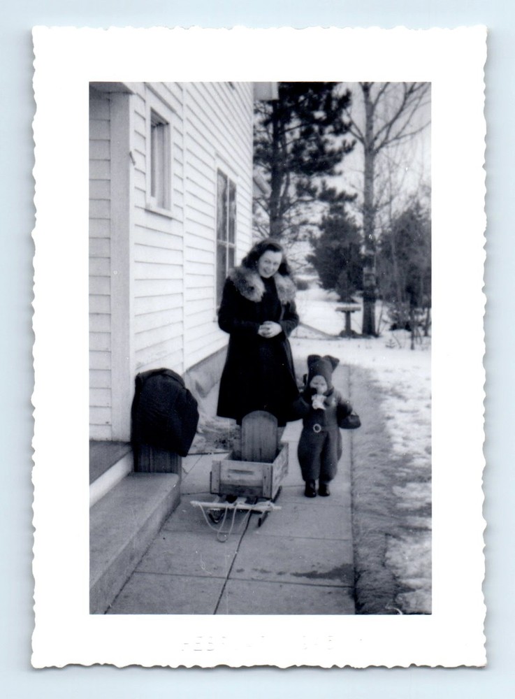Old Vintage Photo WOMAN AND CHILD BY HOUSE SNOW SLED WINTER SCENE SNAPSHOT