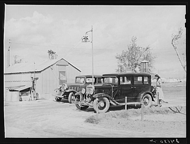 Photo:Cooperative gas station. Shafter migrant camp. Shafter, California