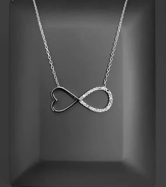 Stunning Infinity Pendant Round Cut Simulated Diamond In 14K White Gold Plated