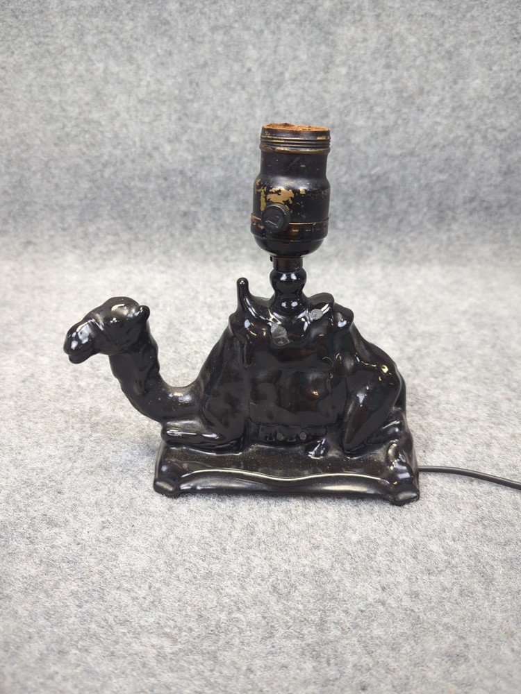 ANTIQUE Cast IRON CAMEL LAMP works