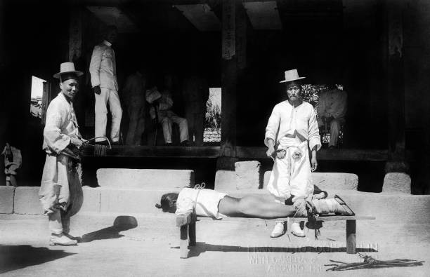 Korean man is beaten with a rod 1910 OLD PHOTO