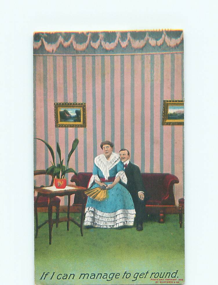 Bamforth comic WOMAN WITH FAN SITS ON MAN'S LAP : make an offer k8091