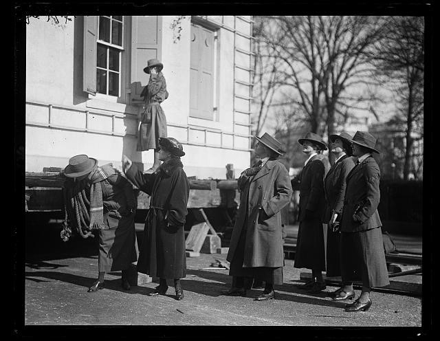 Mrs. Herbert Hoover, center, with the Girl Scouts of America accepting ... Home
