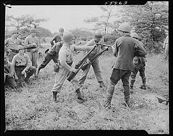 Photo:World War II U.S. Soldiers Training with Bazooka and Rifle 1940s