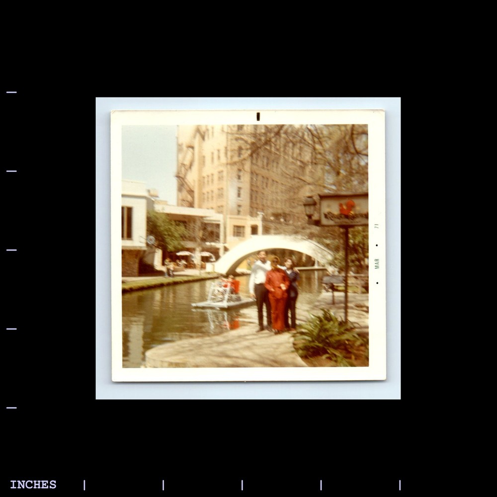 Square Color Photo SOFT FOCUS MAN WOMEN STANDING BY WATER 1971