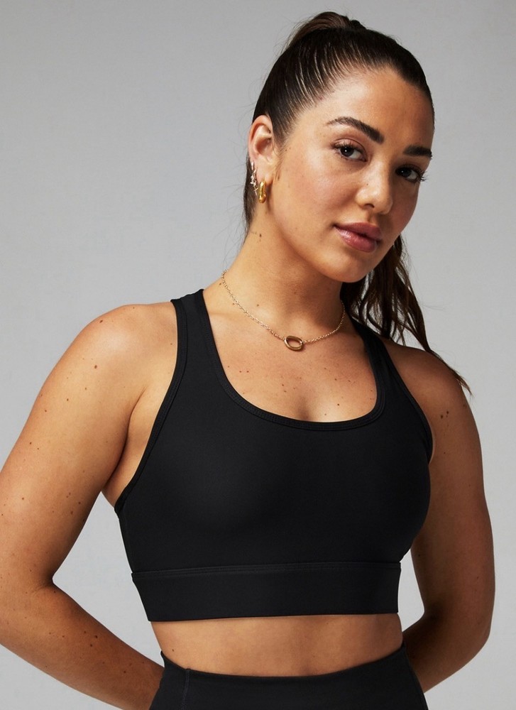 Fabletics Racerback Medium Support Sports Bra w/ Phone Pocket in Black, L