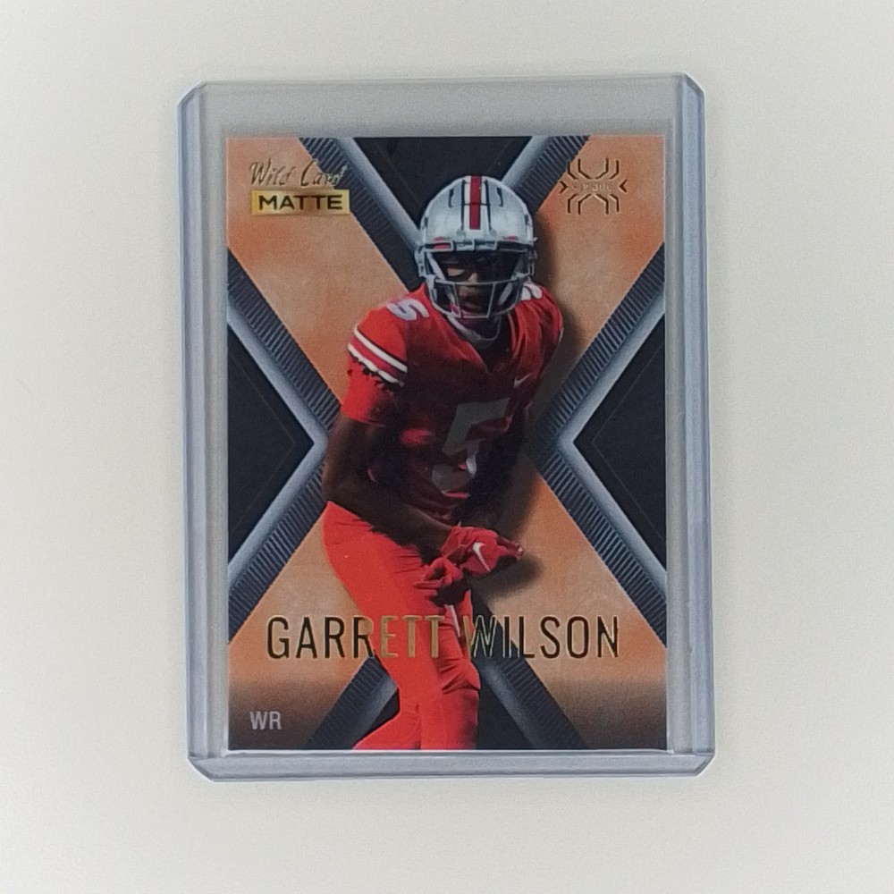 2022 Wild Card MATTE - X-Plode Garrett Wilson #MXP-16 Black-Orange X (RC)