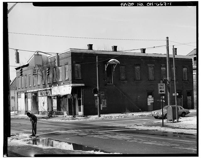 1. VIEW NORTHWEST SHOWING SOUTH (FRONT) AND EAST ELEVATIONS - 1102-1112 Oak