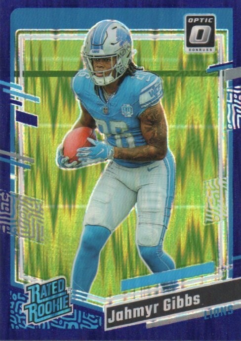 2023 Panini Donruss Optic - Rated Rookie Purple Shock Prizm #236 Jahmyr Gibbs (RC)