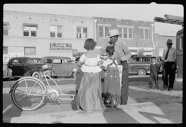Photo:1930s Downtown Street Scene Cowboy Man Children Bicycle Cars