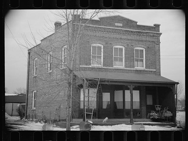 Photo:Bound Brook New Jersey 1936 brick storefront house porch winter