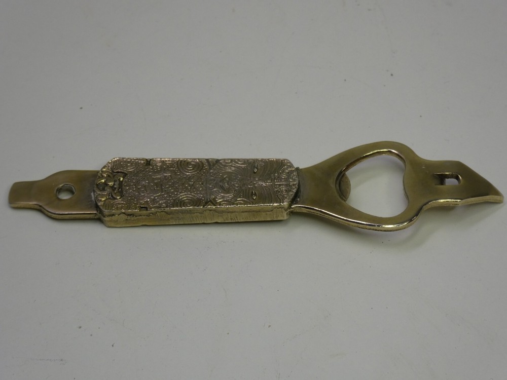 Vintage Tiki Embossed Metal Bottle Opener with Handle