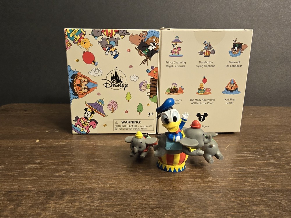 Disney Parks Donald and Dumbo Flying Elephant Figurine Mystery Attraction
