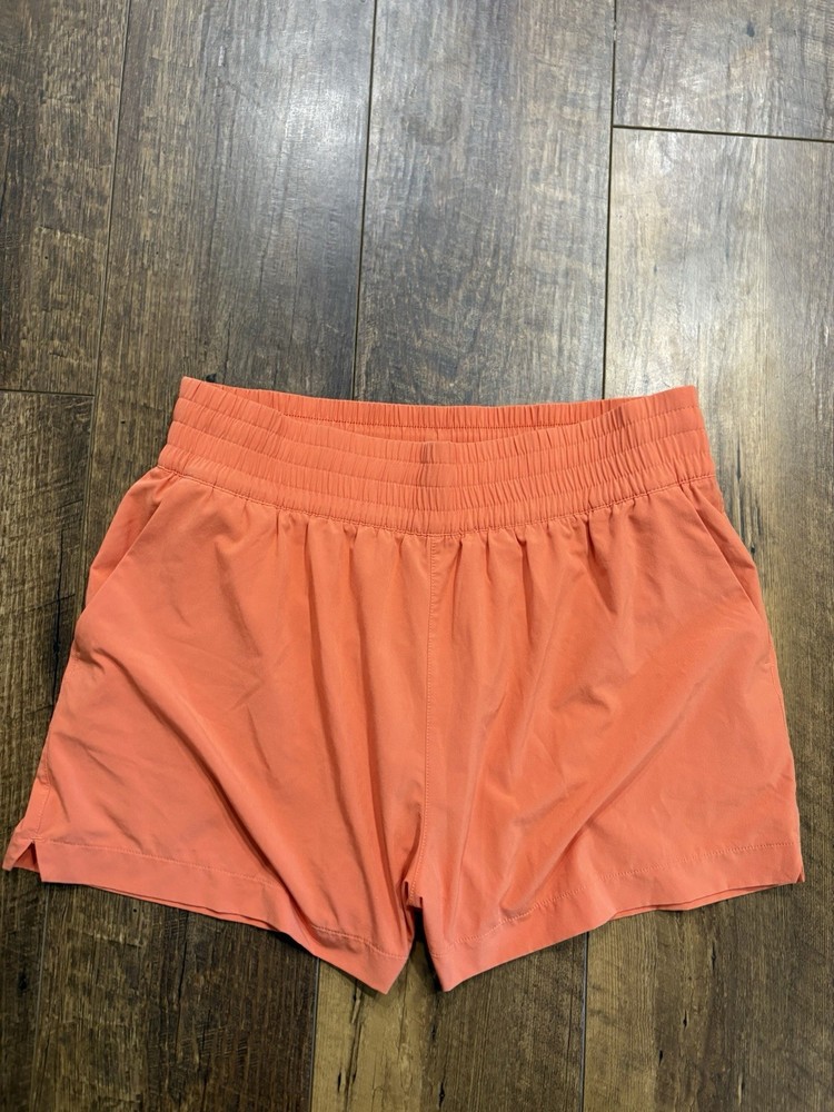 Athleta Women’s High Rise Weekender Run Lined Orange Active Shorts Size M