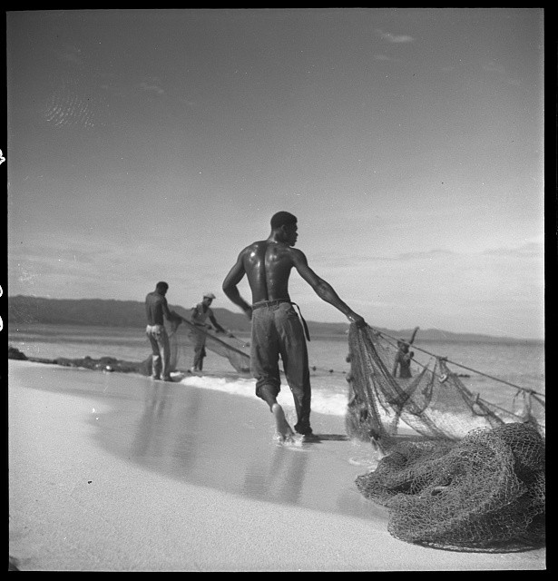 Photo:Men on beach with fishing net, Montego Bay, Jamaica