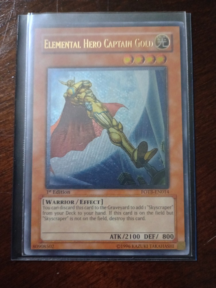 Elemental Hero Captain Gold (UTR) FOTB-EN014 Force of the Breaker 1st Edition