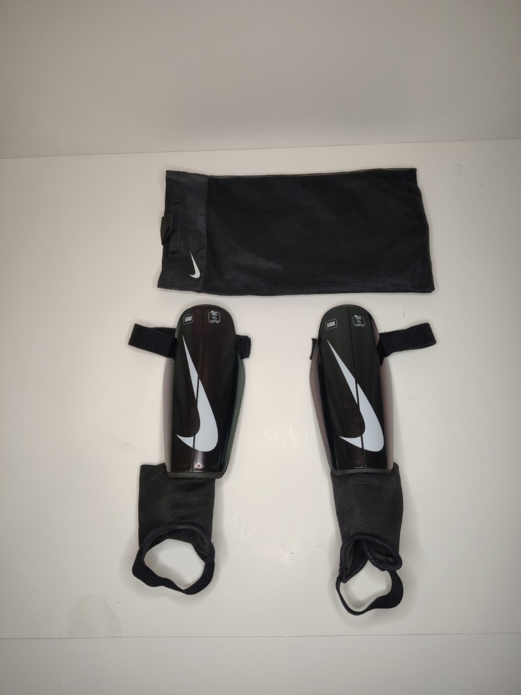 Nike Charge Shin Guards kids Black and White Youth Size small 4' 11