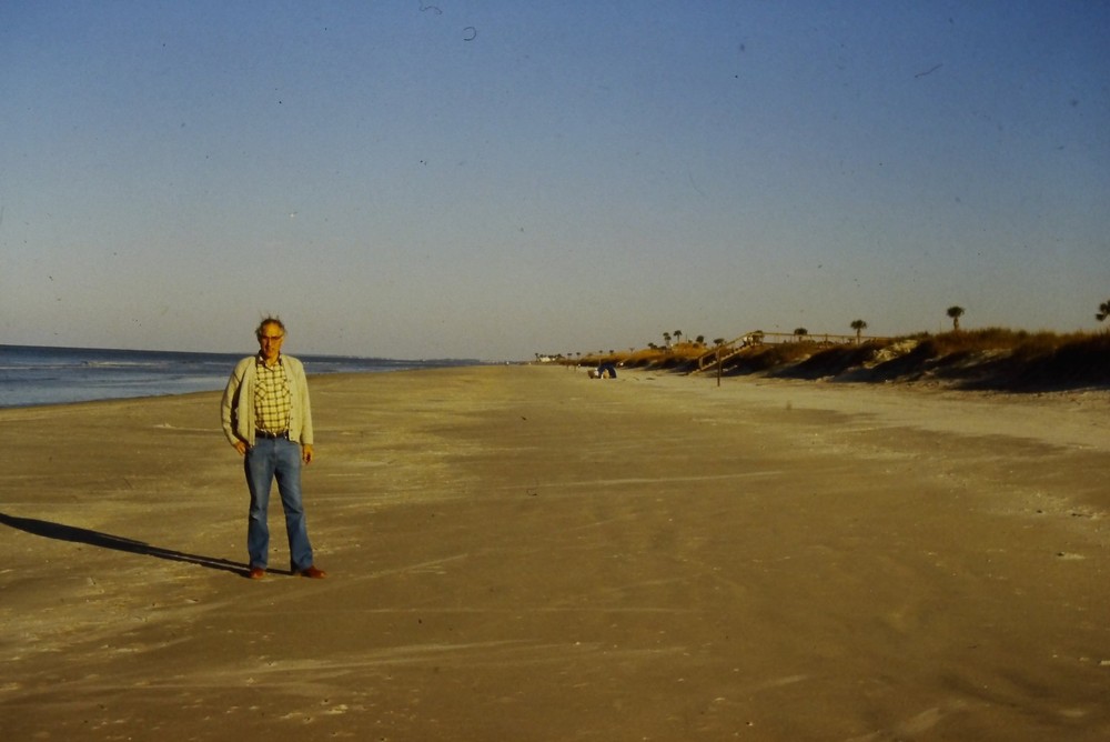 c1970's 35mm Slide Film, Man on Sandy Beach Palm Trees Ocean Fence Wooden