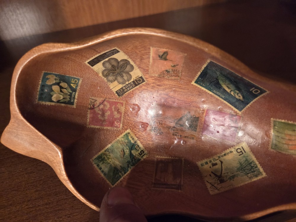 antique hand-carved wood bowl With Stamps Embedded inside bowl