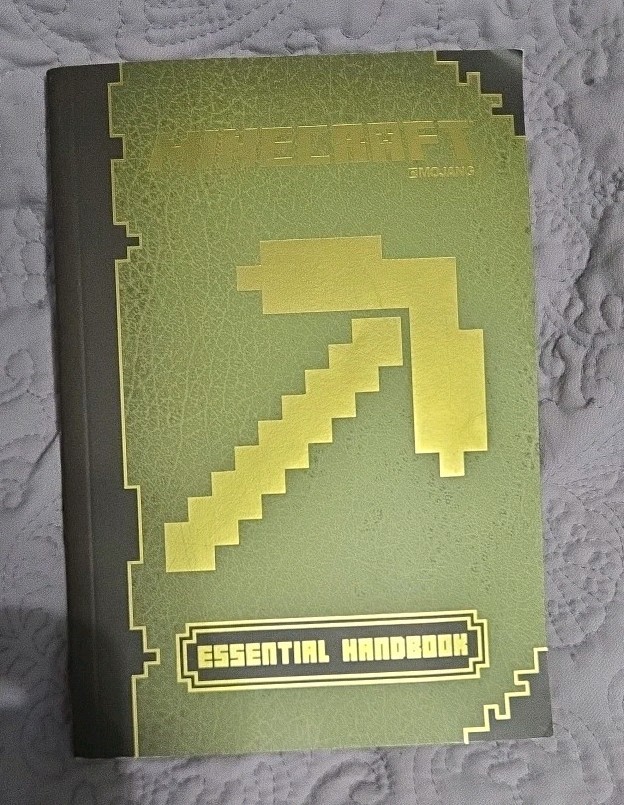 Minecraft Essential Handbook by Stephanie Milton, Paul Soares and Jordan...
