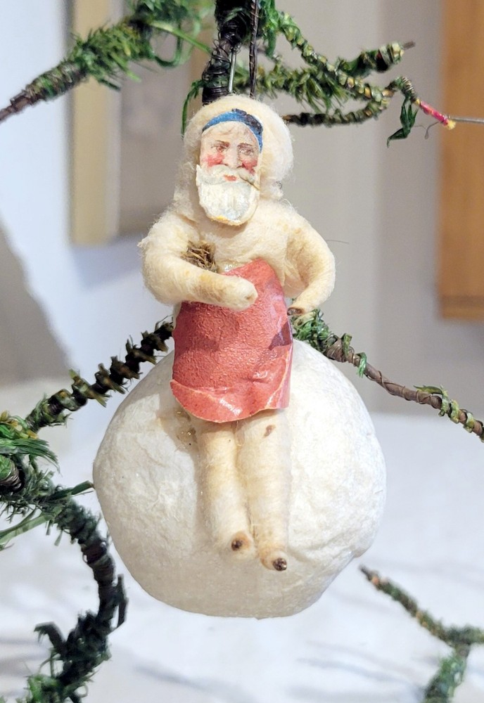 1880s Santa, with paper face, Resting on Snowball. Early German Cotton Orn.
