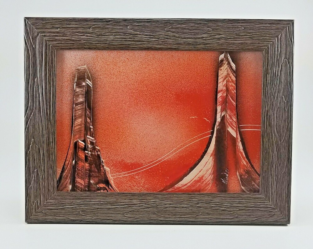 Original Southwestern Painting with a Gray Frame signed by artist Jason Girard.