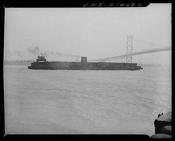 Photo:Michigan. A train ferry near the Ambassador Bridge, Detroit