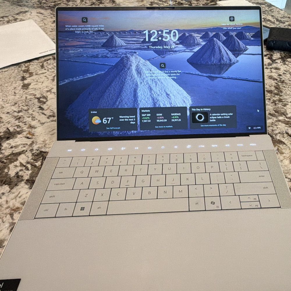 Dell XPS 14 9440 with Intel Ultra 7 155H, RTX 4050, 32GB RAM, and 1TB SSD.